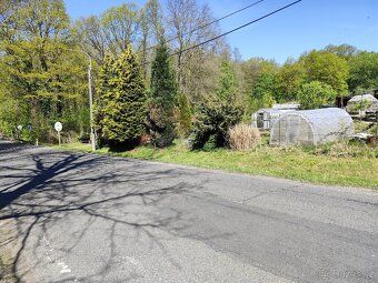 Sell garden with cottage. Includes greenhouse as well.