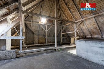 Prodej bytu 1+1 o užitné ploše 46 m² v cihlovém domě v širší