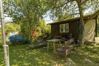 We offer for sale a wooden cottage with a built-up area of 19 m² in Frýdek - Místek