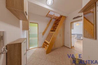 I am exclusively offering for sale an exceptionally spacious duplex apartment of 5+kk layout…