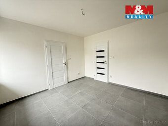 Nabízíme k prodeji krajní řadový rodinný dům 4kk v Podbořane