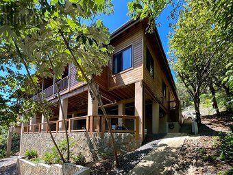 New Latitude is a modern island-style house with an exceptional view of the coral reef and Honduran mainland.