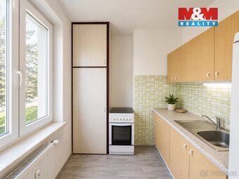 Nabízíme k prodeji prostorný byt o dispozici 3+1 a užitné pl