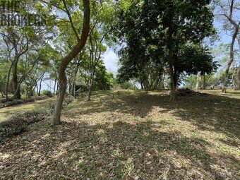 Small enclosed community nestled in rolling hills above protected harbor of Jonesville.