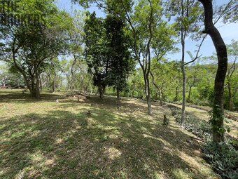Small enclosed community nestled in rolling hills above protected harbor of Jonesville.