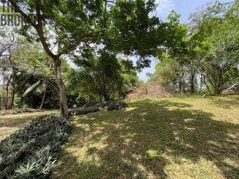 Small enclosed community nestled in rolling hills above protected harbor of Jonesville.