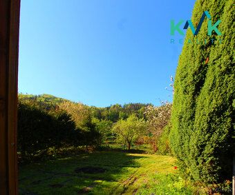 I am offering for sale a wooden cottage on a massive stone foundation