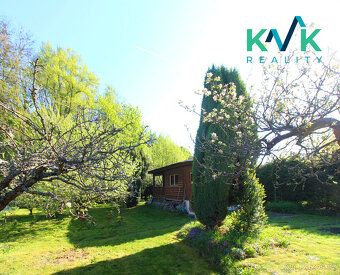 I am offering for sale a wooden cottage on a massive stone foundation