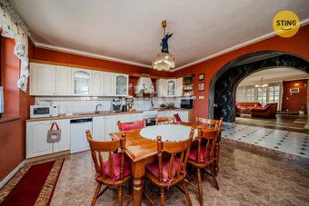 Exclusively offering for sale a family house 4+1 with garden featuring mature trees, an arbour…