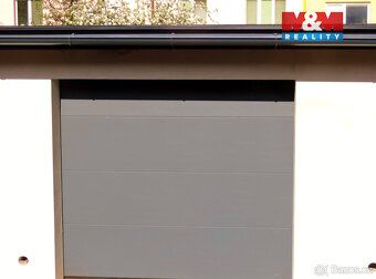 We offer for rent new garage/warehouse right in the center of town K