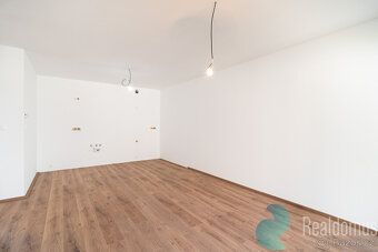 REALDOMUS exclusively mediates the sale of a modern apartment unit