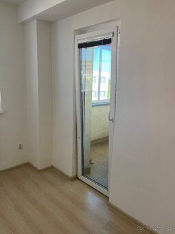 For sale apartment on the third floor of a brick house.
