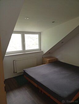 Rent new attic flat 2+kk, second floor, partially furnished, spacious bathroom.
