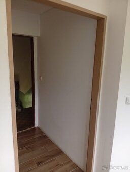 Rent new attic flat 2+kk, second floor, partially furnished, spacious bathroom.