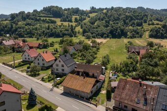 We offer for sale a family house with construction land (possibility of more), field - approx.