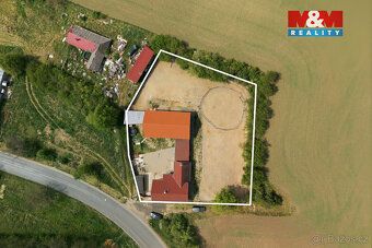 We offer for sale a detached family house with land