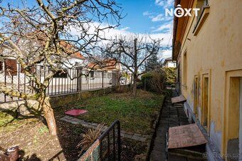 Sale of terraced family house with garden on border of Vysočany and Prosek