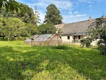 Sell sunny slightly sloped plot of land in quiet village Křivá - Dl