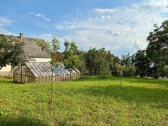 Sell sunny slightly sloped plot of land in quiet village Křivá - Dl