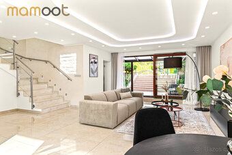 Looking for a modern house within walking distance of the square that still offers absolute privacy?