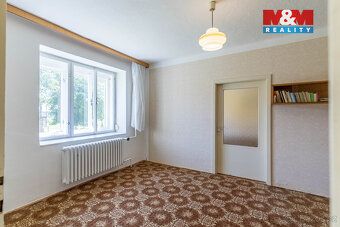 Nabízíme k prodeji samostatně stojící rodinný dům v centru o