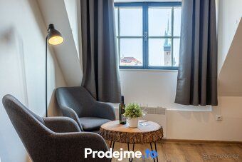Ev.č. 100205 Tři podkrovní apartmány (celkem 108 m²) v histo