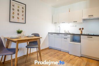 Ev.č. 100205 Tři podkrovní apartmány (celkem 108 m²) v histo