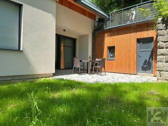 Bedřichov Apartment House has a total capacity of 3 apartments and 1 studio apartment, in an…