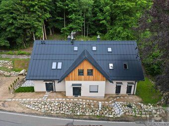 Bedřichov Apartment House has a total capacity of 3 apartments and 1 studio apartment, in an…