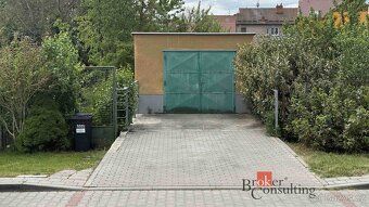 Sale of a 2 bedroom house with garden, garage, workshop and parking space
