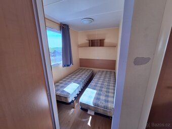 Nabízíme k prodeji mobilní dům IRM o rozměrech 8 x 3m. Fasád