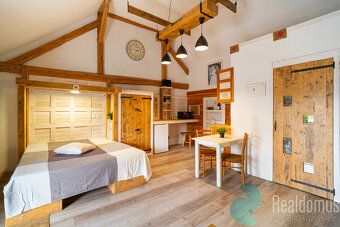 We offer for sale sensitively reconstructed stone farmhouse in Český Krumlov
