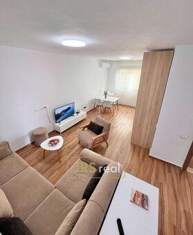 Ev.č. 00115-1 Nabízíme ke koupi útulný apartmán o dispozici 