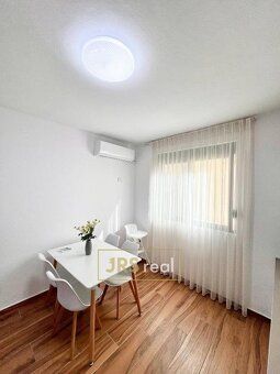 Ev.č. 00115-1 Nabízíme ke koupi útulný apartmán o dispozici 