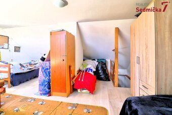 Ev.č. 00585 Hledáte bydlení, které kombinuje klid rodinného 