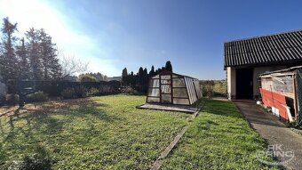 Family house 230 m2 featuring two residential units with garage in Kolin