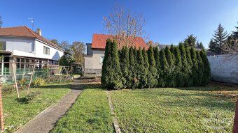 Family house 230 m2 featuring two residential units with garage in Kolin