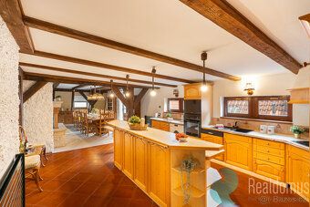 This exceptional attic apartment represents a unique combination of historical charm and modern comfort.