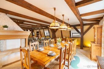 This exceptional attic apartment represents a unique combination of historical charm and modern comfort.