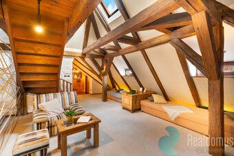 This exceptional attic apartment represents a unique combination of historical charm and modern comfort.