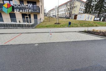 We offer rental of an outdoor parking space in Duslova Street, Beroun