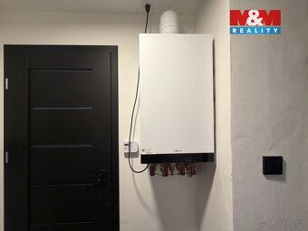 Nabízíme k prodeji moderně zrekonstruovaný byt 2+1 o užitné 