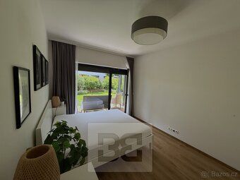 Ev.č. N09206 Krásný a prakticky řešený byt 2+kk se zahradou 