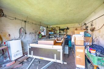 We offer exclusively a plot of land with a barn, registered in the cadastre as a garage…