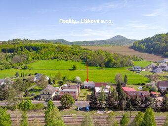 We offer exclusively a plot of land with a barn, registered in the cadastre as a garage…