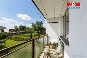 We offer for sale a spacious 3BR apartment with loggia and own garage in quiet village of Chodská Lhota.