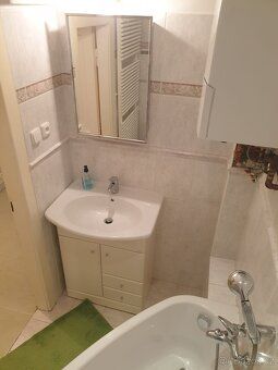 I offer bright, non-pass through, furnished room of approx. size 2