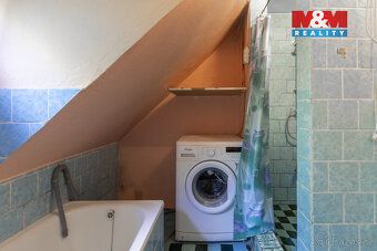 Nabízíme k prodeji samostatně stojící rodinný dům v centru o