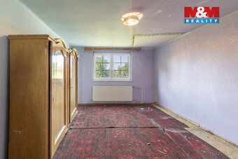 Nabízíme k prodeji samostatně stojící rodinný dům v centru o