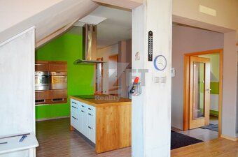 For sale spacious house where you can live and run business.